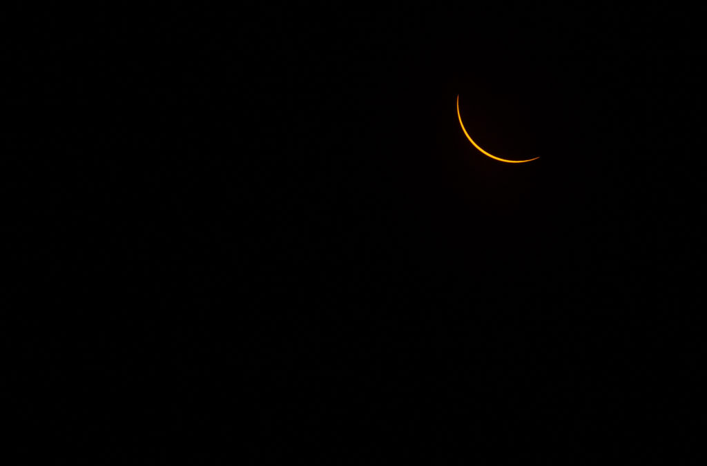 The thin crescent of the sun during the eclipse